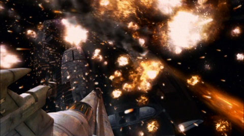 A Viper mark VII heads into a field of explosions around Galactica
