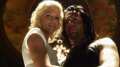 Six and Baltar look down at their future child in one of the Doctor's hallucinations in the Oprah house.