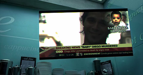 A monitor in a coffee shop displays the BBC News headline 'Baby Diego Murdered', with a picture of the 18 year-old Deigo and the years of his life 2009–2027.