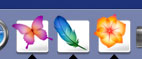 InDesign CS 2, Photoshop CS 2, and Illustrator CS 2 icons in the Mac OS X dock