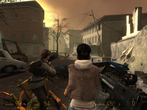 Alyx and a female resistance member look out onto a city street, with the sunlight filtering through the dusty air, at antlions attacking amongst rubble and wrecked cars.