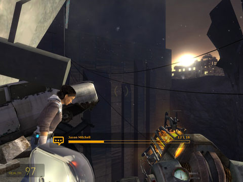 A yellow commentary track bar sits in the lower third of the screen, as Alyx looks down the pit surrounding the Citadel. A commentary balloon can be seen in lower left.