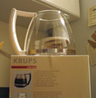 The new carafe, atop its box.