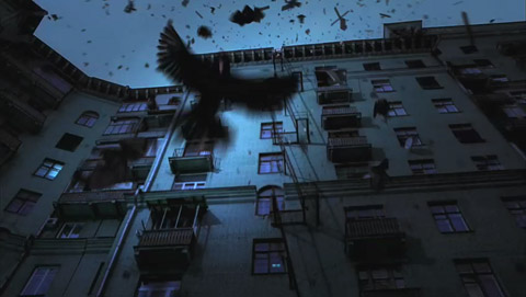 Crows swoop down from a rooftop, literally springing forth from the debris.