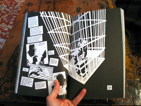 An interior spread from 'That Yellow Bastard', showing the protagonist Hartigan in jail.