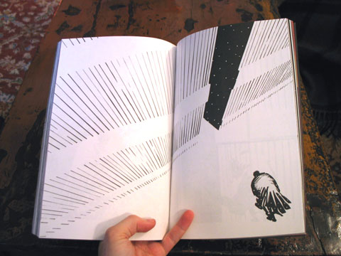 An interior spread from 'That Yellow Bastard', showing the protagonist Hartigan limping into a barn.