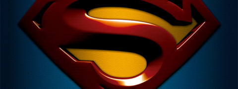 The new shiny, 3-D Superman emblem on blue fabric, cropped at the top and bottom