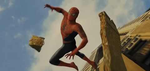 Spider-Man falls towards the viewer, along with chunks of concrete.