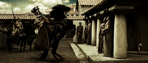 A Persian emmisary rears his horse at in a Spartan courtyard.