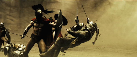 Two Spartans bash back the Persians with their shields during one of the assaults.