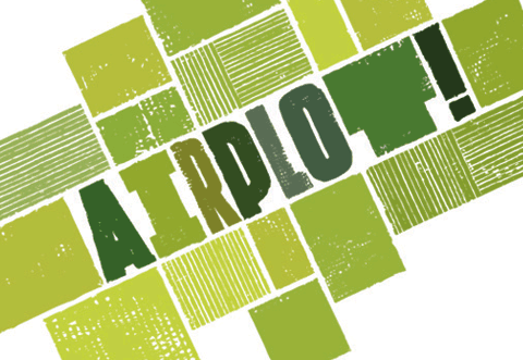 The Airplot logo, which is a hand printed patchwork of letters and rectangle in varying greens, made with cardboard letters and rectangles, creating a patchwork effect like a group of fields seen from above.