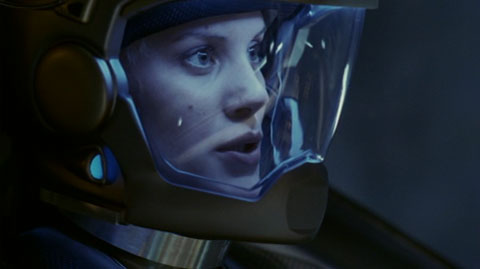 Starbuck in her space suit in the cockpit of her Viper.
