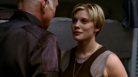 Lt. Starbuck smirks at her XO.