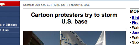 A screen capture of a CNN headline, which reads: Cartoon protesters try to storm U.S. base.