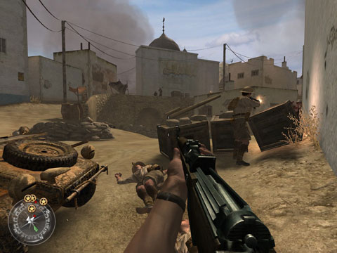 British soliders fire on German positions in a dusty North African town.