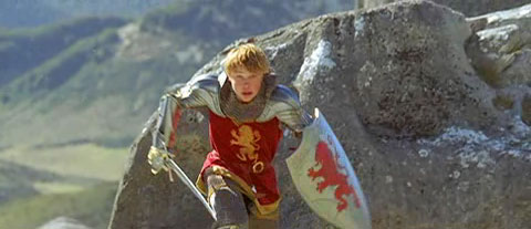 Peter charges forward on foot, sword in hand