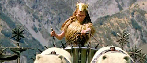 The white witch leads her dark army in a chariot driven by polar bears while she wears the shorn mane of Aslan.