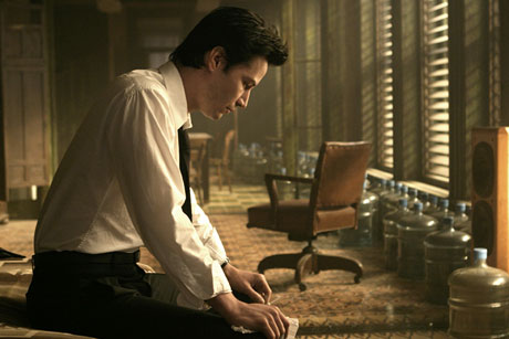 Keanu Reeves as John Constantine in a reflective moment