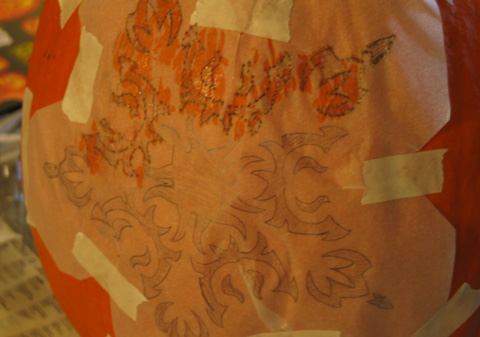 My pumpkin design on tracing paper, part-way through the punching process. 