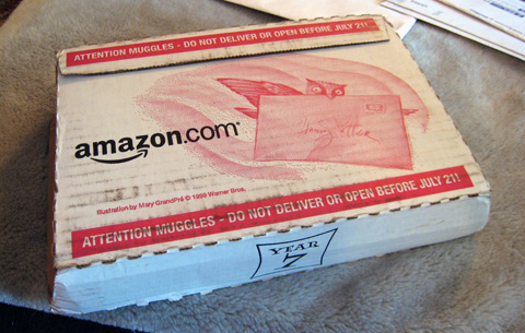 The Amazon box for the book, with Harry Potter designs and a warning that reads 'Attention Muggles - Do not deliver or open before July 21!'