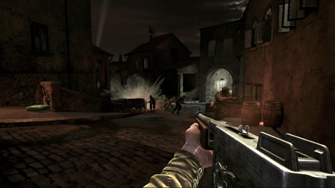 Looking down the street towards enemy soldiers fleeing a grenade detonation.