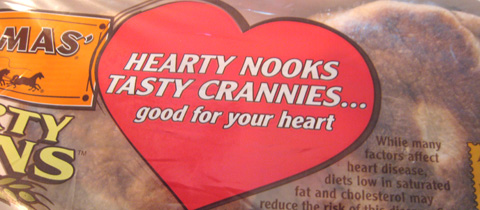 The label on a package of Thomas' English muffins that reads, Hearty nooks tasty crannies...good for your heart.