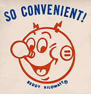 The head of Reddy Kilowatt, mascot for electricity smiles underneath blue condensed sans serif letters reading 'SO CONVENIENT!.
