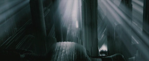An interior shot of the fortress of solitude, dark, striated crystal columns angle to create a cavern that allows in shafts of light.