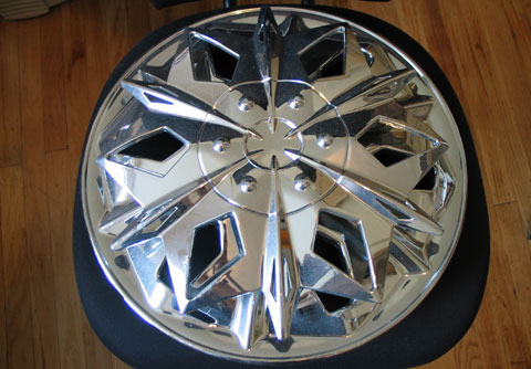 A faux-chrome spinner with snowflake design.